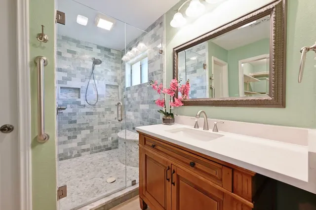 a bathroom with a sink and a mirror