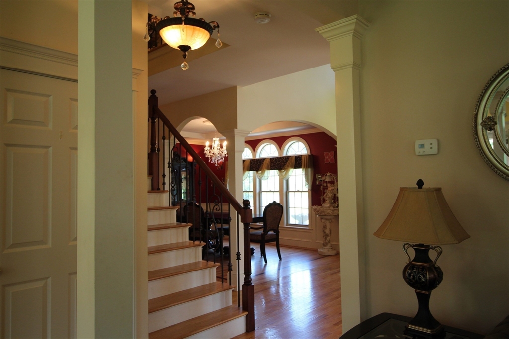 5 Gableview Lane Southwick, MA 01077 - Photo 20 of 41 a view of entryway and hall with wooden floor