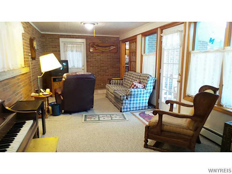 4109 Beach Ridge Road Pendleton, NY 14120 - Photo 15 of 25 Den. The 24x11 is behind the front home built in 1