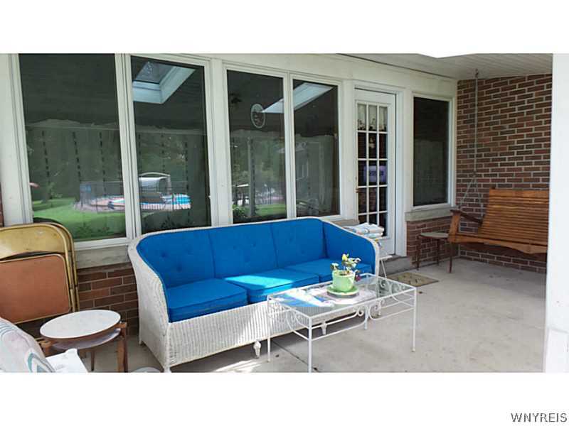 4109 Beach Ridge Road Pendleton, NY 14120 - Photo 23 of 25 Patio. The covered patio sits behind the den. Vie