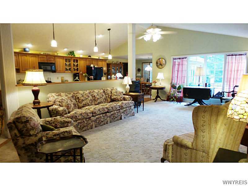 4109 Beach Ridge Road Pendleton, NY 14120 - Photo 6 of 25 Living Room. The 24x14 living room has a cathedral
