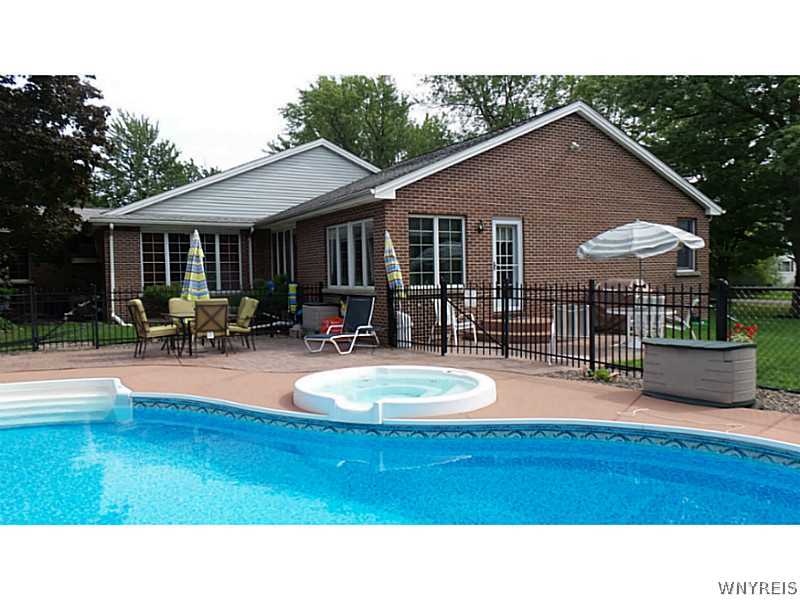 4109 Beach Ridge Road Pendleton, NY 14120 - Photo 9 of 25 Pool In Ground. Walk out of the sun room and into