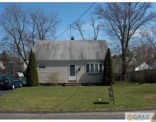 53 Tunison Road New Brunswick, NJ 08901 - Photo 1 of 10 a front view of house with a garden