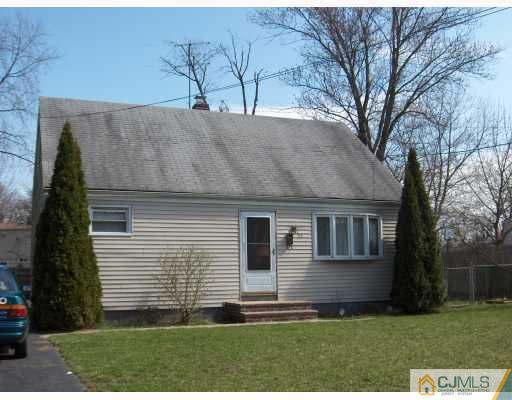 53 Tunison Road New Brunswick, NJ 08901 - Photo 2 of 10 a front view of a house with a yard