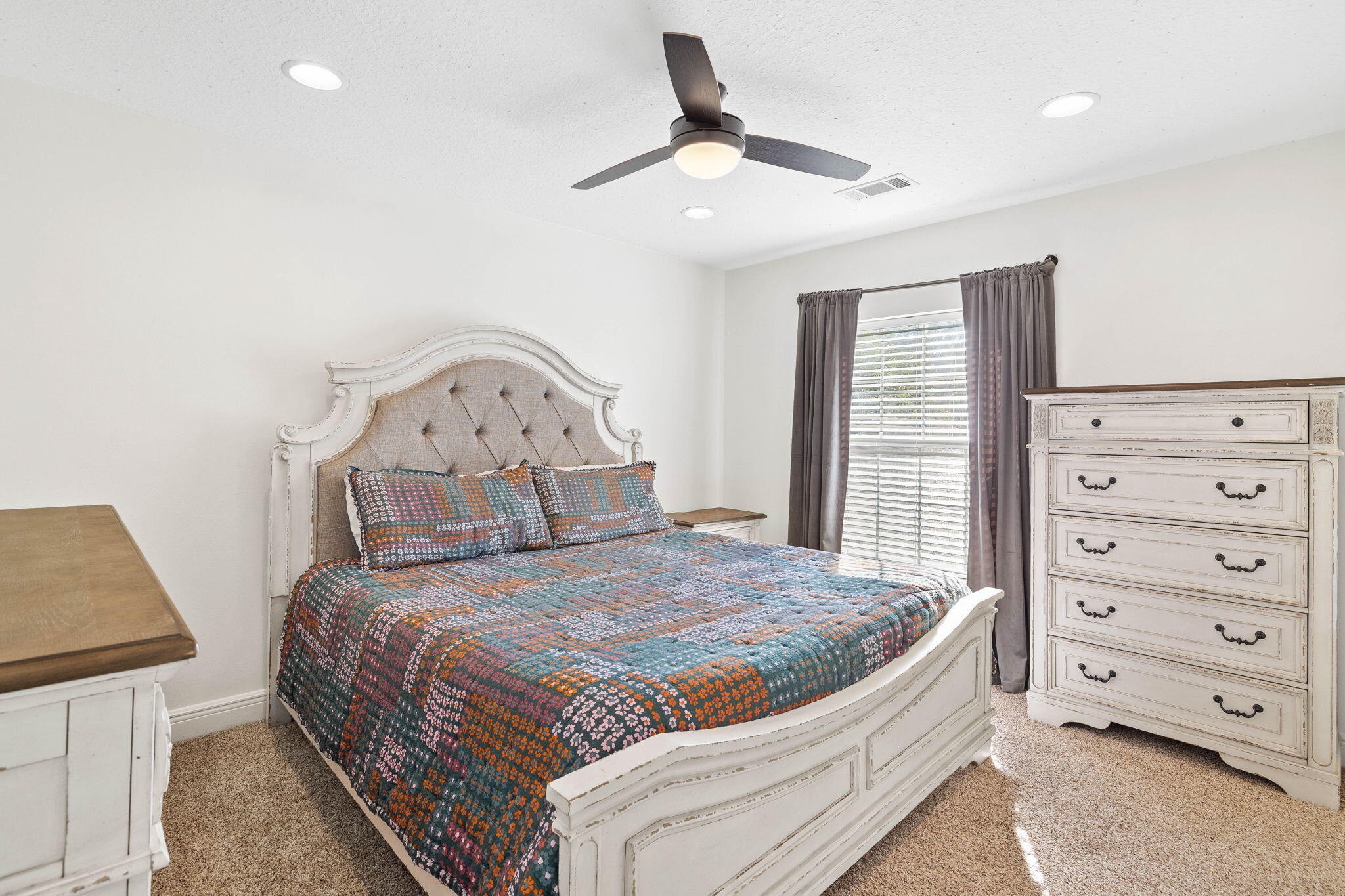 201 Mattie's Way Destin, FL 32541 - Photo 31 of 61 a bedroom with a bed and a dresser