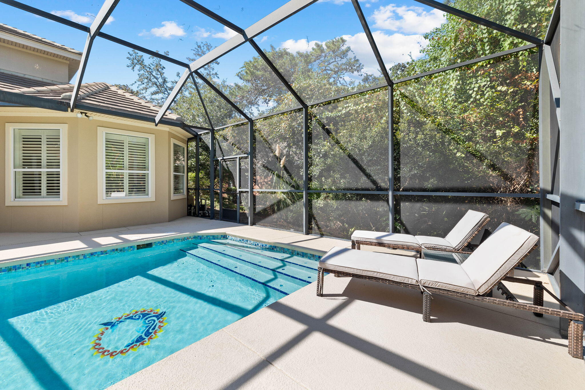 201 Mattie's Way Destin, FL 32541 - Photo 45 of 61 a roof deck with table and chairs and potted plants