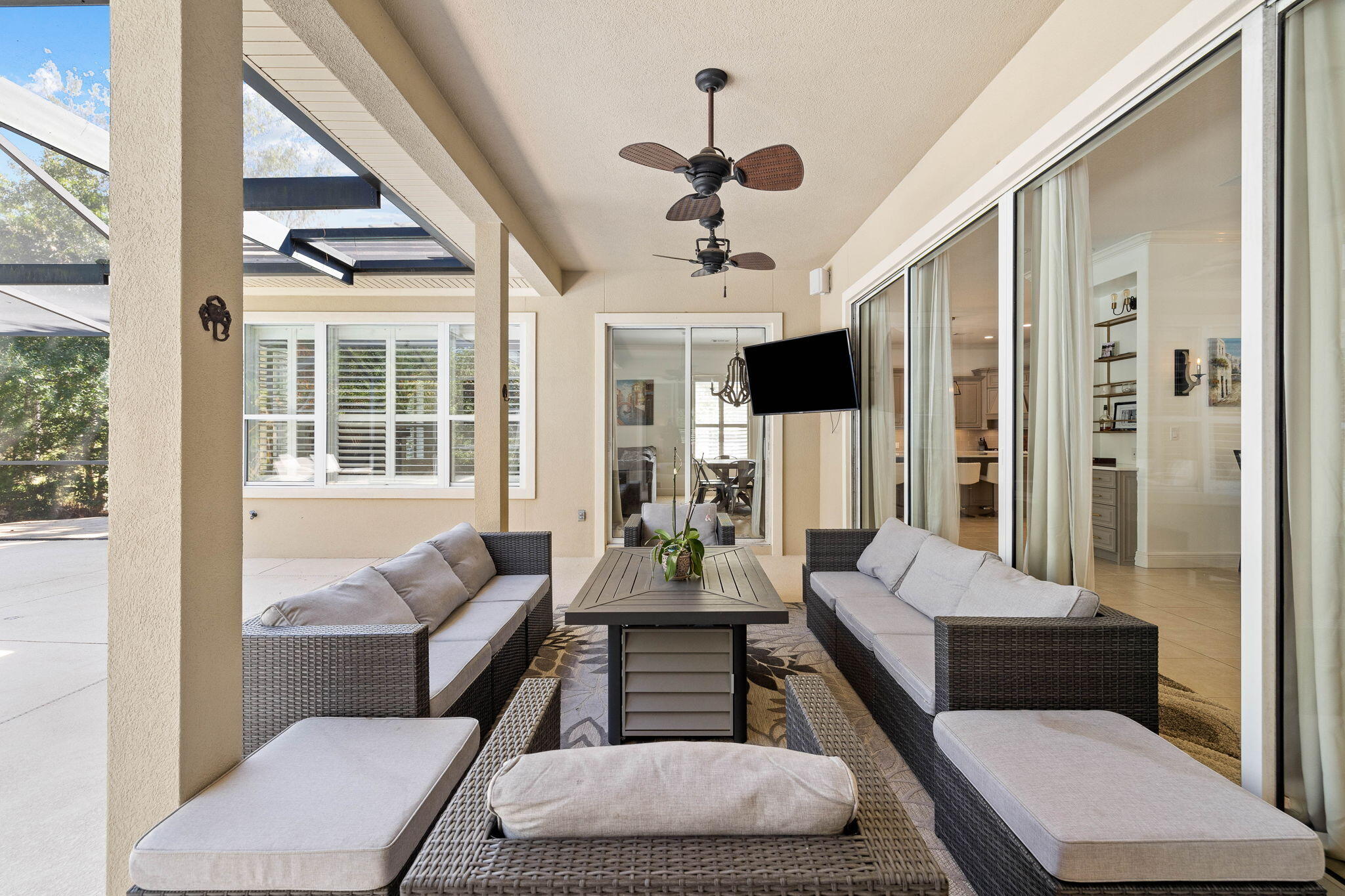 201 Mattie's Way Destin, FL 32541 - Photo 47 of 61 a living room with furniture and a large window