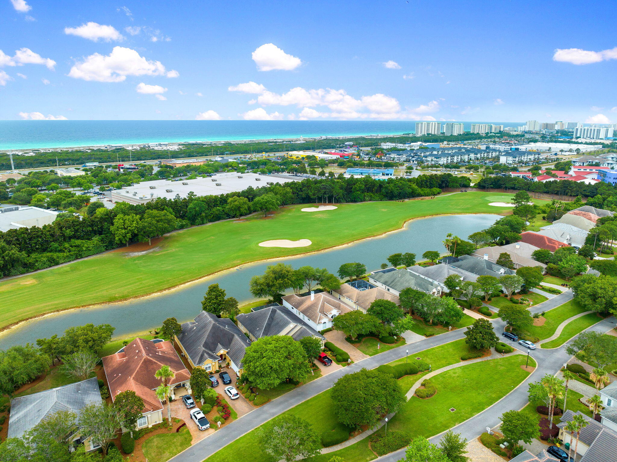 201 Mattie's Way Destin, FL 32541 - Photo 52 of 61 an aerial view of a city with lots of green space