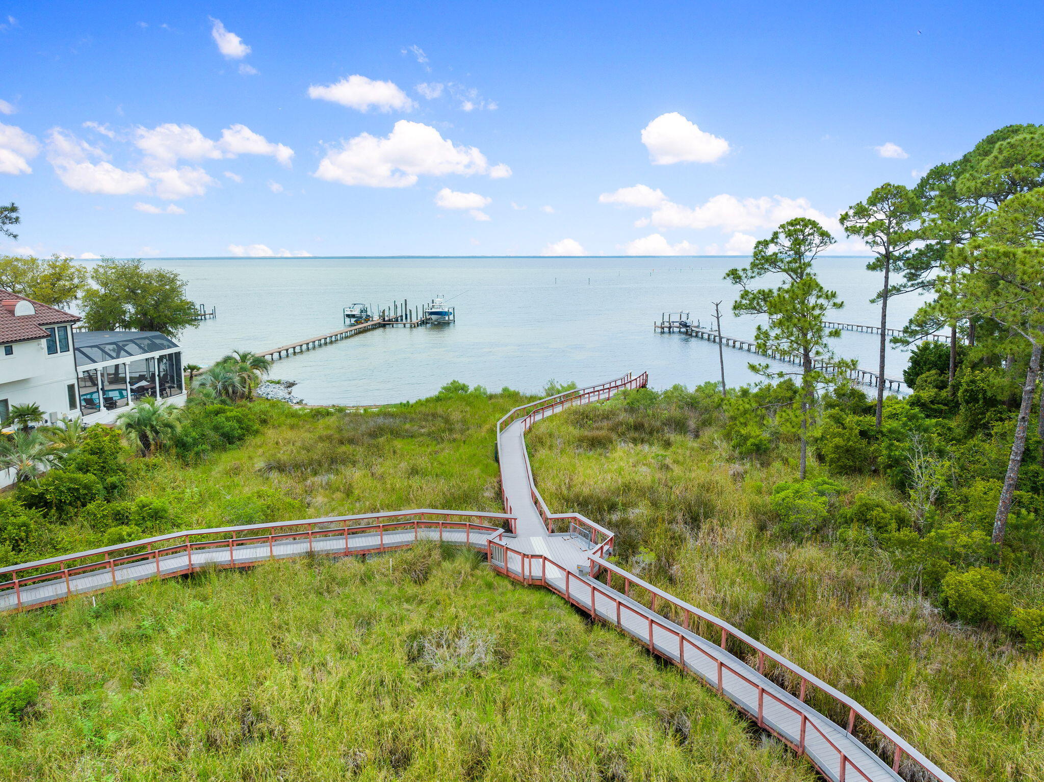 201 Mattie's Way Destin, FL 32541 - Photo 59 of 61 a view of a yard with a swimming pool