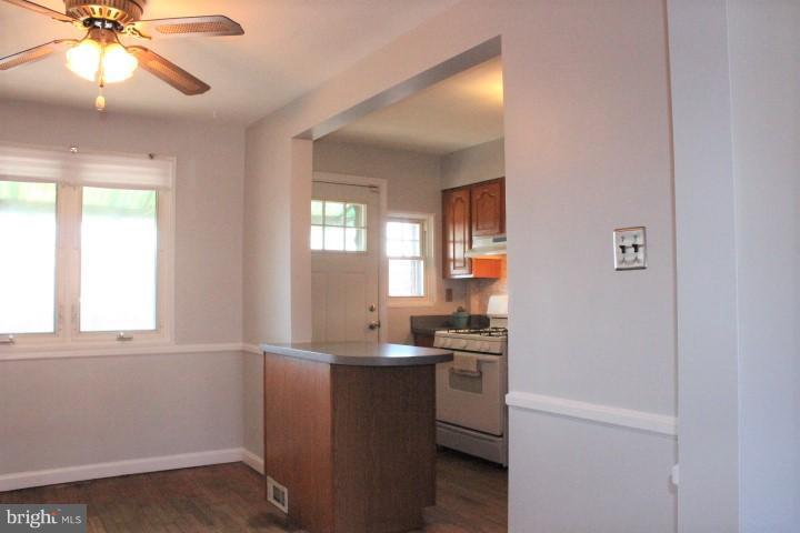 7845 Wynbrook Road Baltimore, MD 21224 - Photo 11 of 29 Dining room open to kitchen