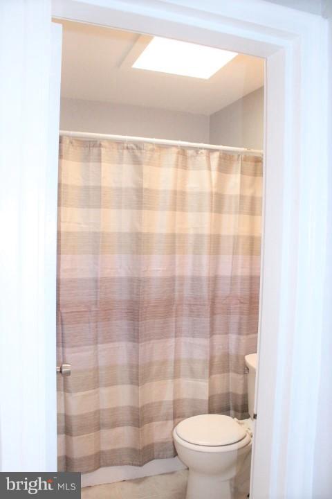7845 Wynbrook Road Baltimore, MD 21224 - Photo 20 of 29 Skylight in updated bathroom
