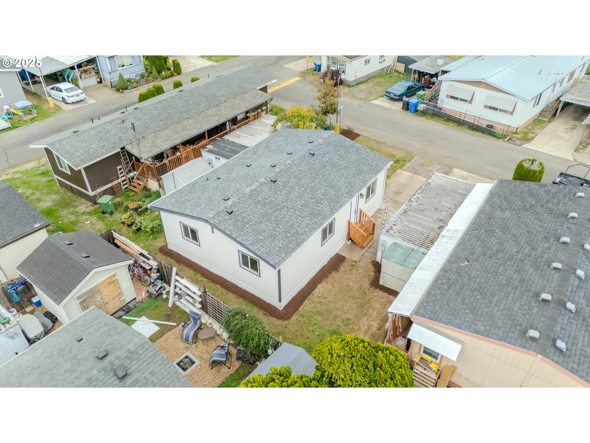 3370 Maple Street, Unit 44 Hubbard, OR 97032 - Photo 28 of 29 an aerial view of a house with a garden