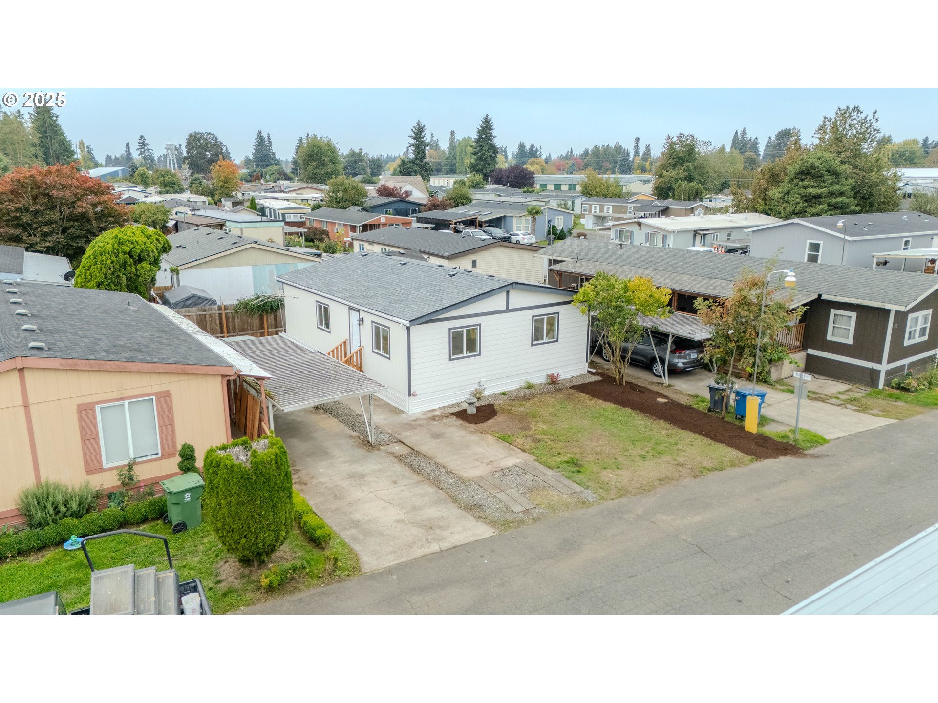 3370 Maple Street, Unit 44 Hubbard, OR 97032 - Photo 3 of 29 a picture of houses with outdoor space