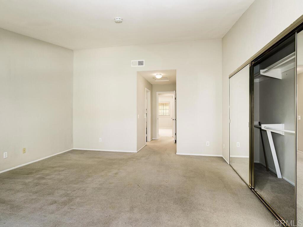 1718 Tecalote Drive, Unit 14 Fallbrook, CA 92028 - Photo 20 of 40 an empty room with closet
