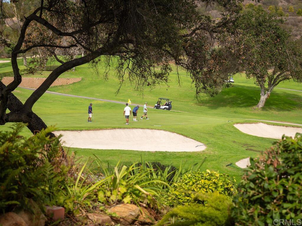 1718 Tecalote Drive, Unit 14 Fallbrook, CA 92028 - Photo 2 of 40 a view of a park with a tree