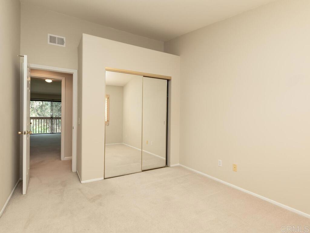 1718 Tecalote Drive, Unit 14 Fallbrook, CA 92028 - Photo 26 of 40 an empty room with closet