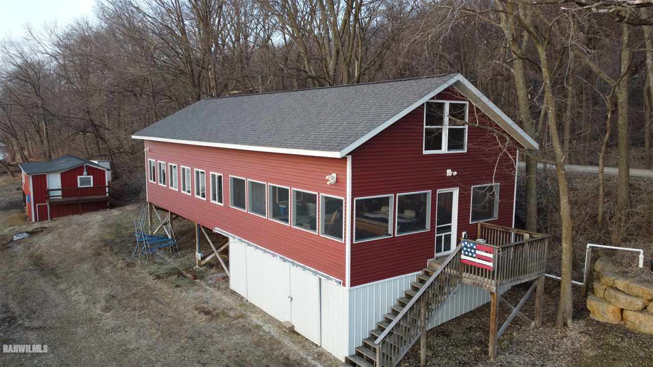 5476 South River Road Hanover, IL 61041 - Photo 2 of 17 a view of a house with a yard