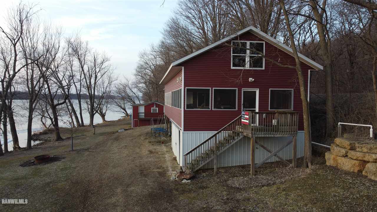5476 South River Road Hanover, IL 61041 - Photo 3 of 17 a view of a house with a yard