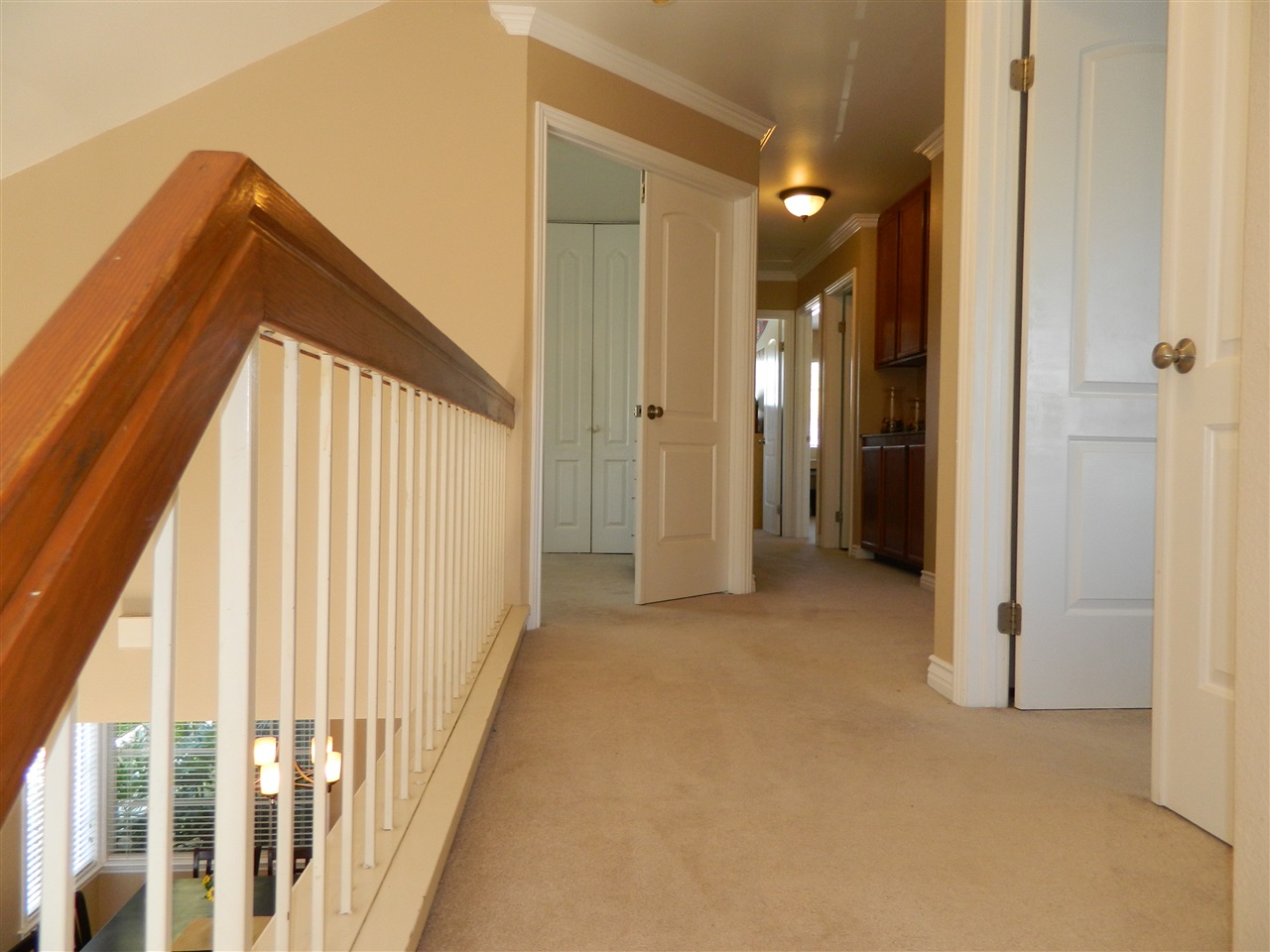 686 Rue Avallon Chula Vista, CA 91913 - Photo 12 of 25 Upstairs hallway "master bdrm 1st door to the right"