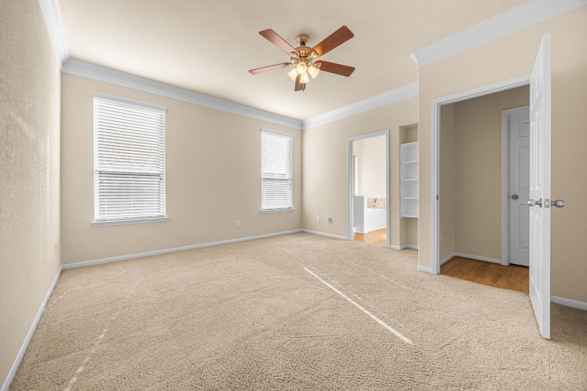 2922 Coachmaker Trail Rosenberg, TX 77471 - Photo 13 of 29 Spacious primary retreat with en-suite bathroom.