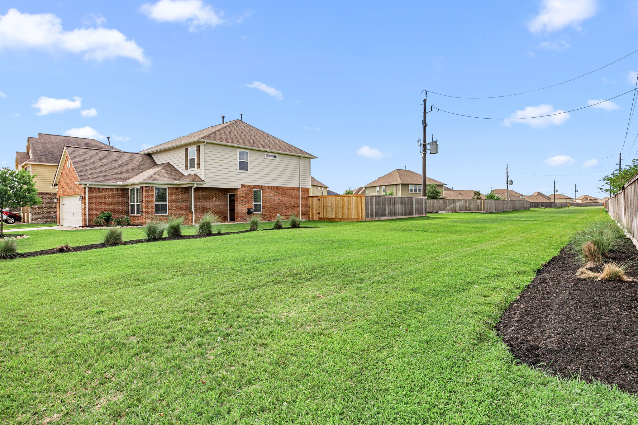 2922 Coachmaker Trail Rosenberg, TX 77471 - Photo 24 of 29 The easement to the right of the home provides additional space to run and play!