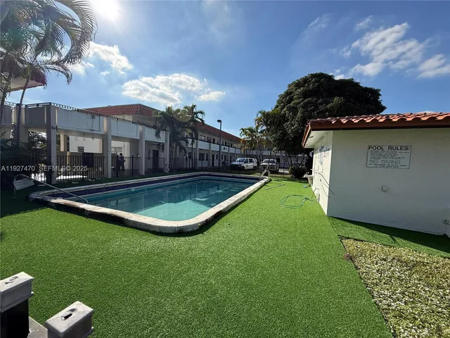 a view of a backyard with a garden