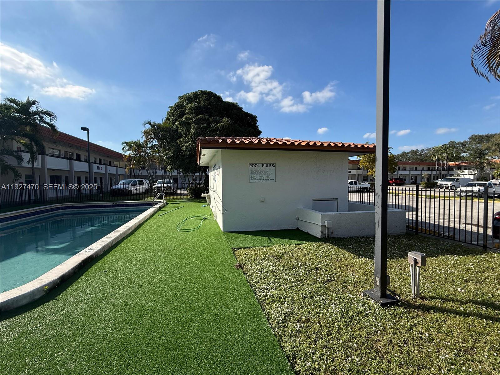 400 Northwest 65th Avenue, Unit 227 Margate, FL 33063 - Photo 13 of 13 a view of a backyard with a garden