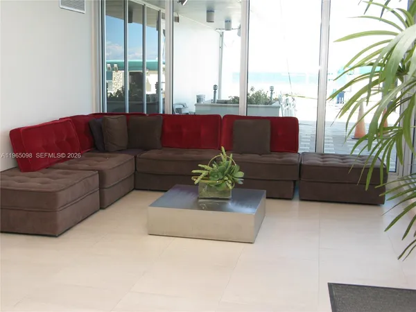 a view of a balcony with an ocean view
