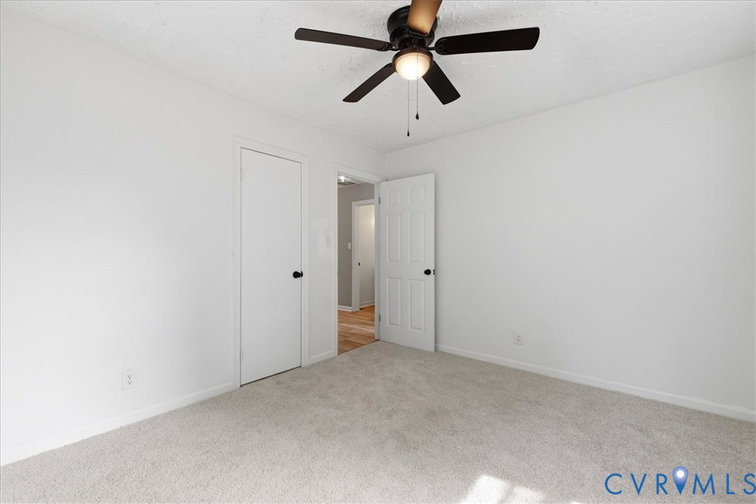 5306 Sterling Road Petersburg, VA 23803 - Photo 24 of 39 an empty room with closet and fan