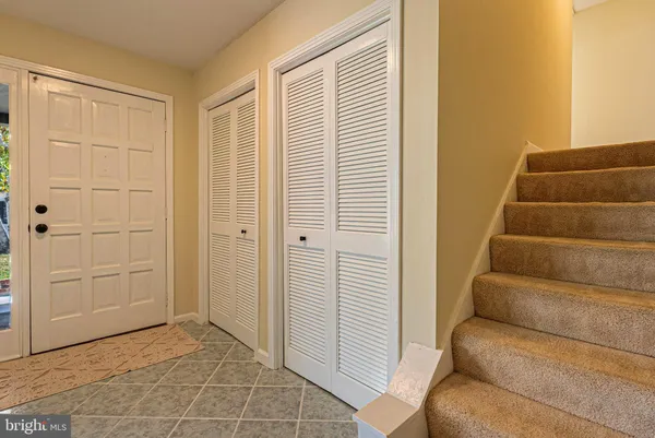 a view of an entryway with staircase