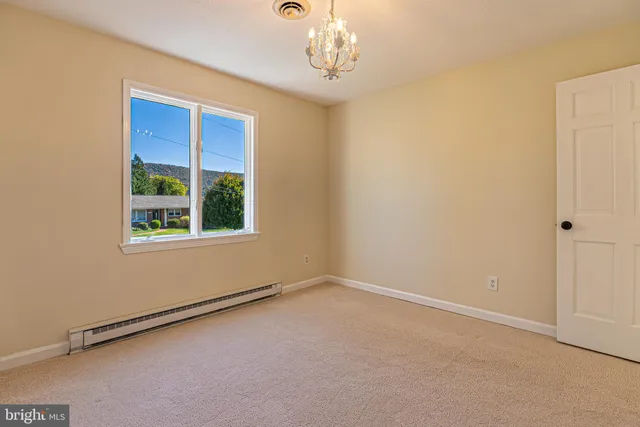 an empty room with a window