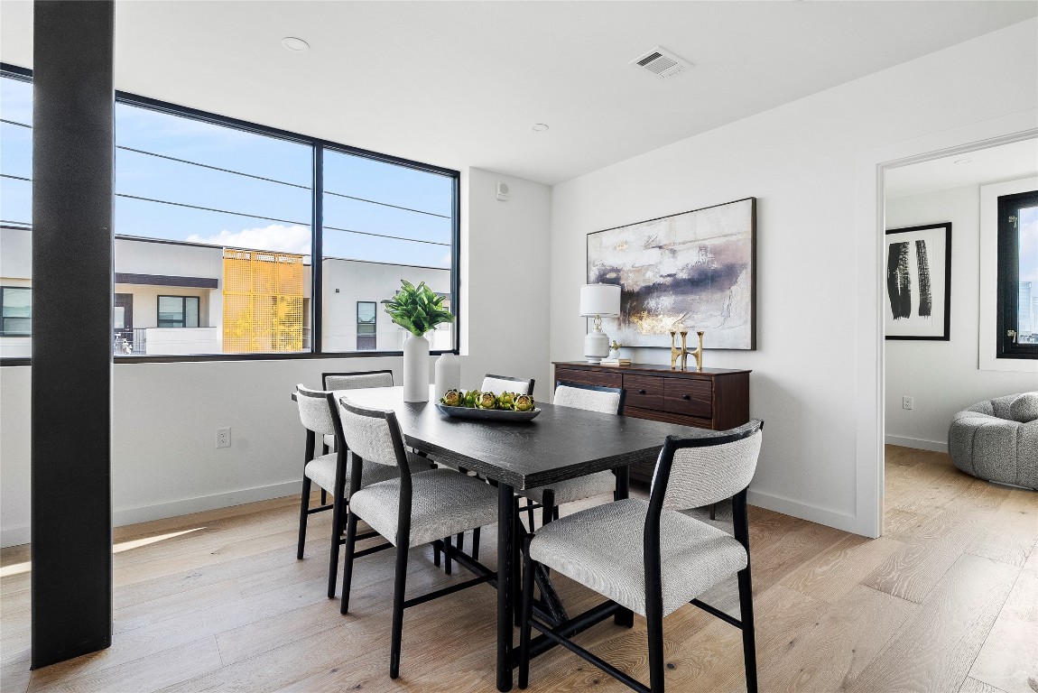 1800 East 4th Street, Unit 396 Austin, TX 78702 - Photo 15 of 20 a view of a dining room with furniture and window