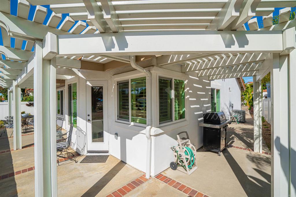 4717 Majorca Way Oceanside, CA 92056 - Photo 21 of 33 a view of a patio with couches chairs and potted plants