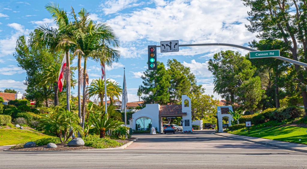 4717 Majorca Way Oceanside, CA 92056 - Photo 24 of 33 a picture of a building with a garden and plants