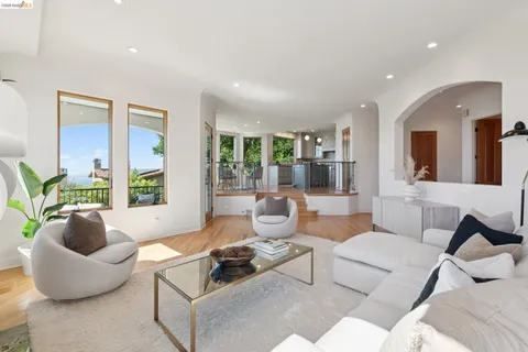 a bathroom with a sink mirror and toilet
