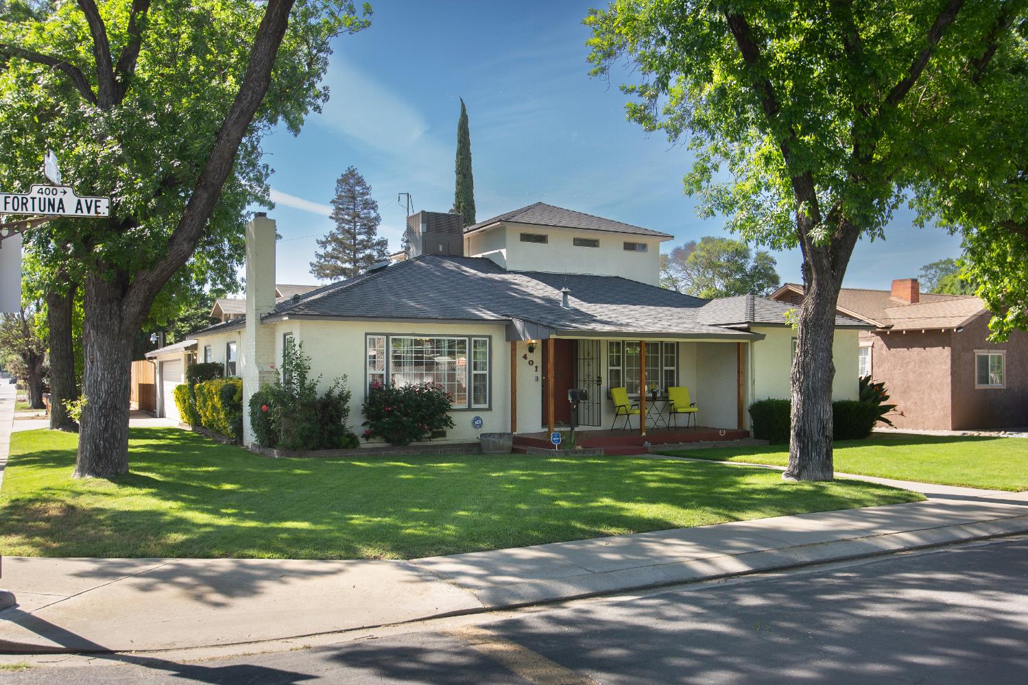 401 Fortuna Avenue Modesto, CA 95354 - Photo 6 of 51 a front view of a house with a yard