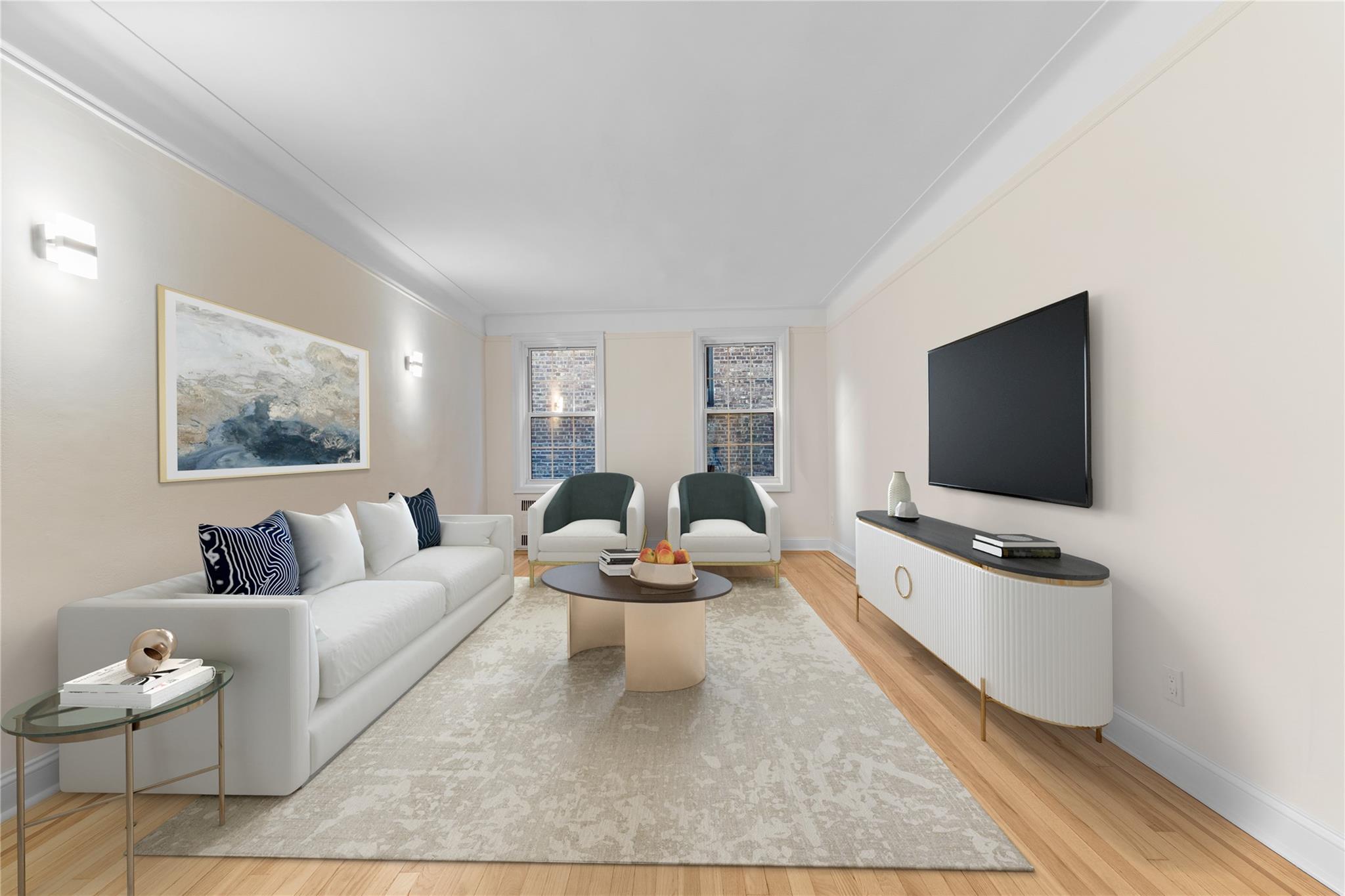 Living area featuring wood finished floors, crown molding, and baseboards