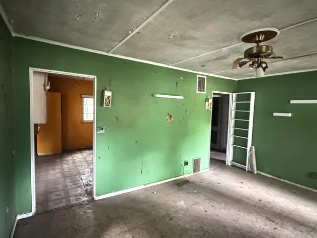a view of a bathroom with a shower and a sink