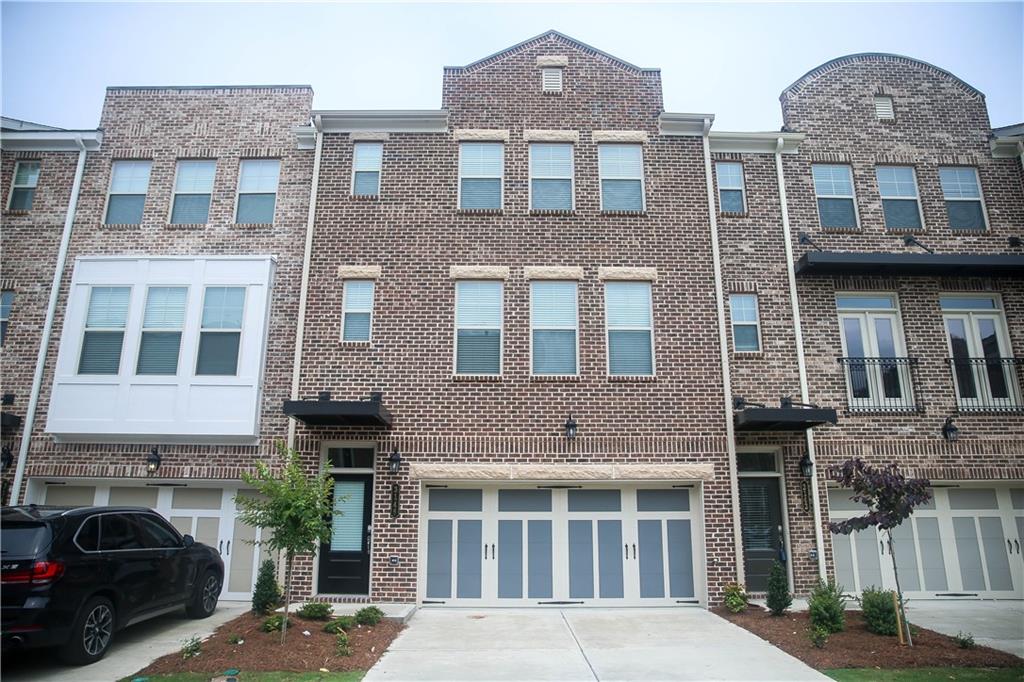 a front view of a building with balcony