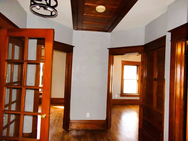view of room with window and wooden floor
