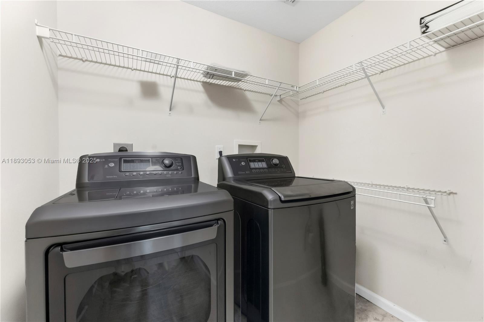 275 Murcia Drive, Unit 104 Jupiter, FL 33458 - Photo 13 of 26 a view of storage and utility room with washer and dryer