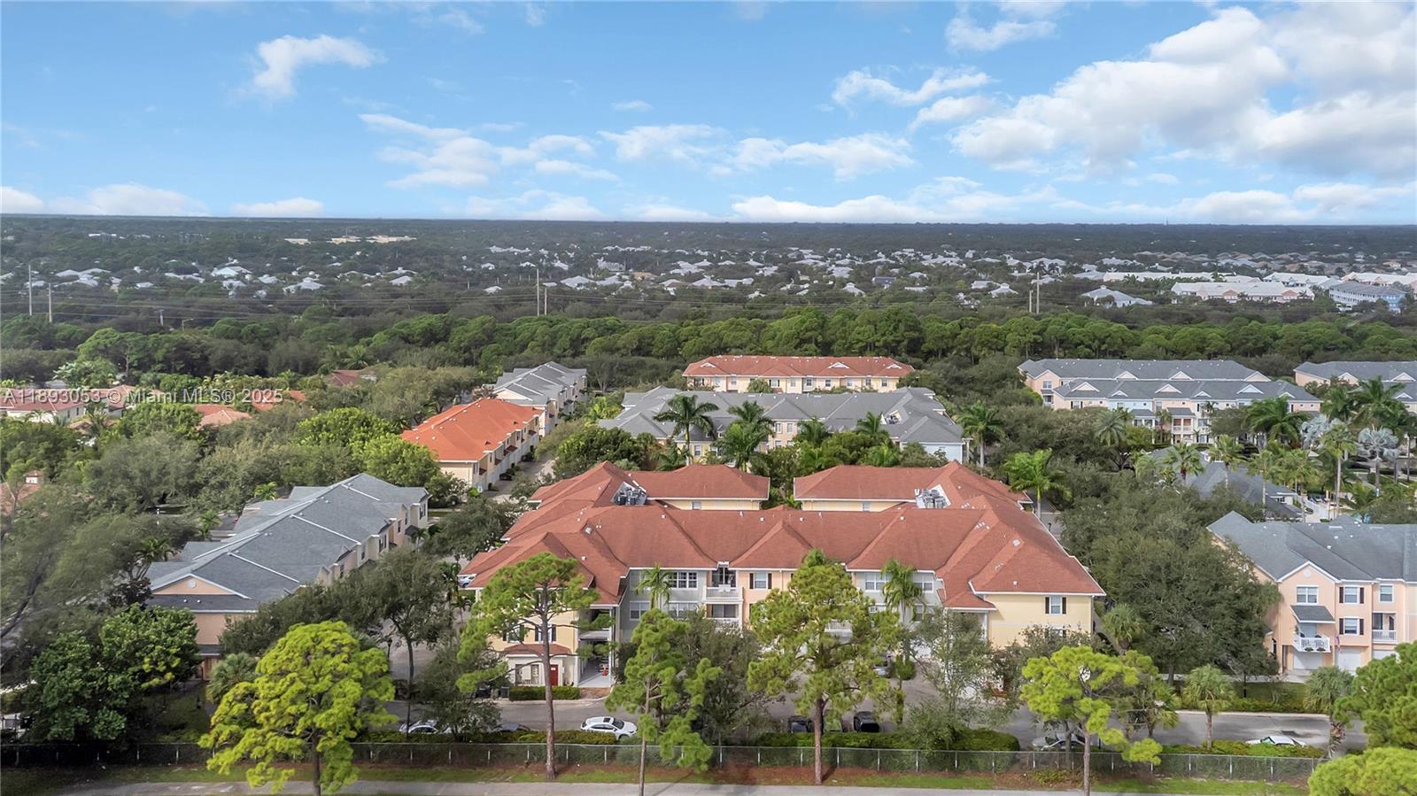 275 Murcia Drive, Unit 104 Jupiter, FL 33458 - Photo 18 of 26 an aerial view of residential houses with outdoor space
