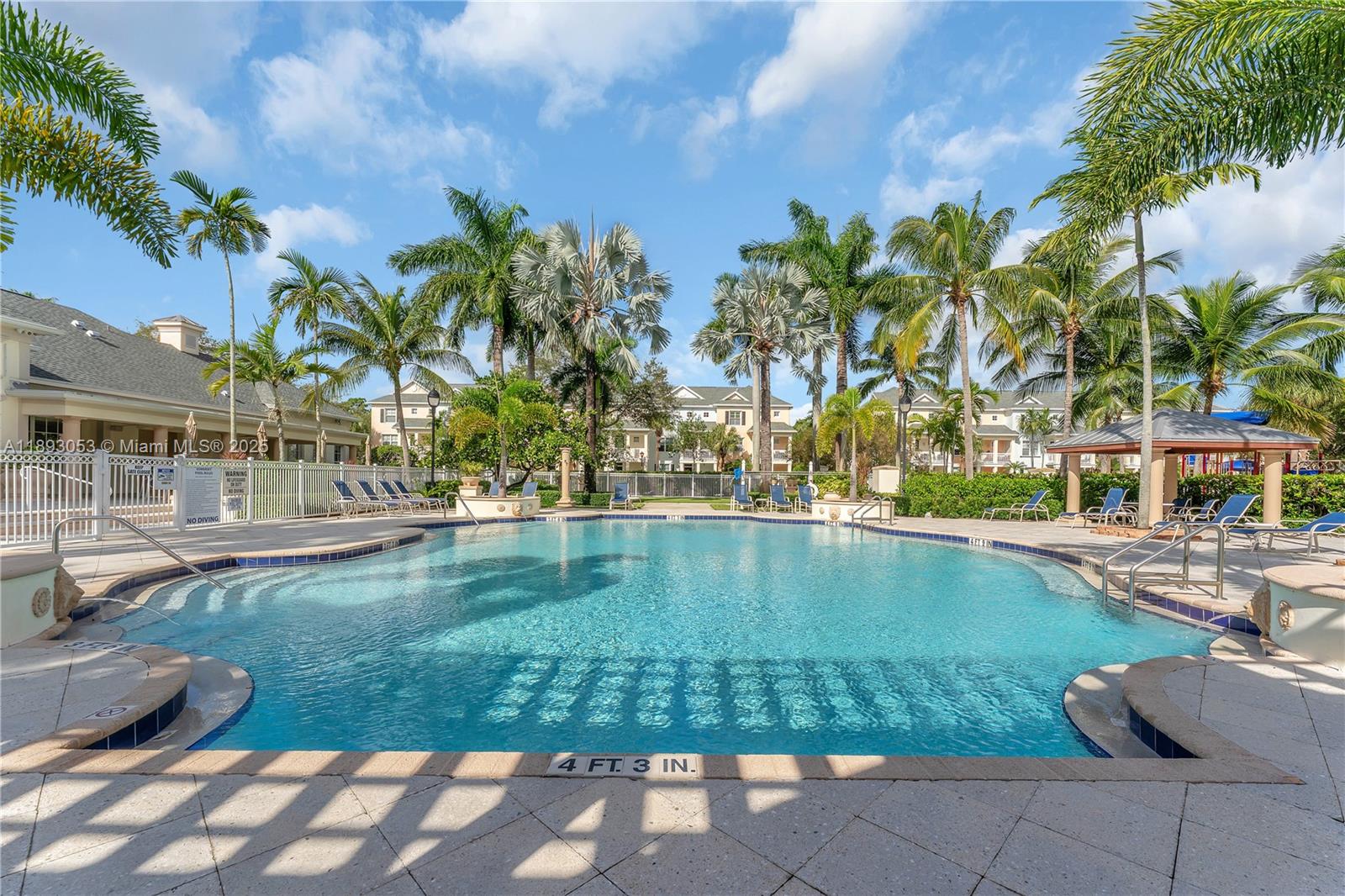 275 Murcia Drive, Unit 104 Jupiter, FL 33458 - Photo 23 of 26 a view of a swimming pool with a patio
