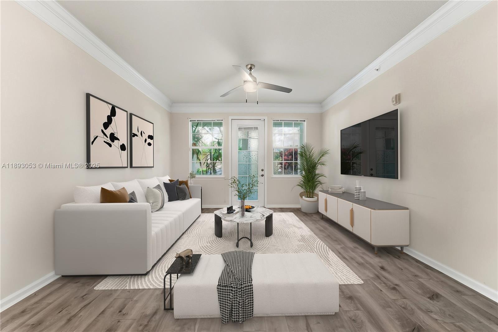 275 Murcia Drive, Unit 104 Jupiter, FL 33458 - Photo 3 of 26 a living room with furniture and a flat screen tv