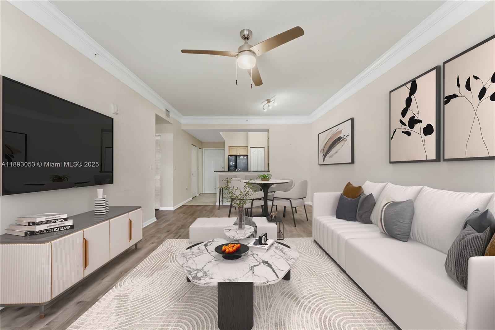 275 Murcia Drive, Unit 104 Jupiter, FL 33458 - Photo 4 of 26 a living room with furniture and a flat screen tv