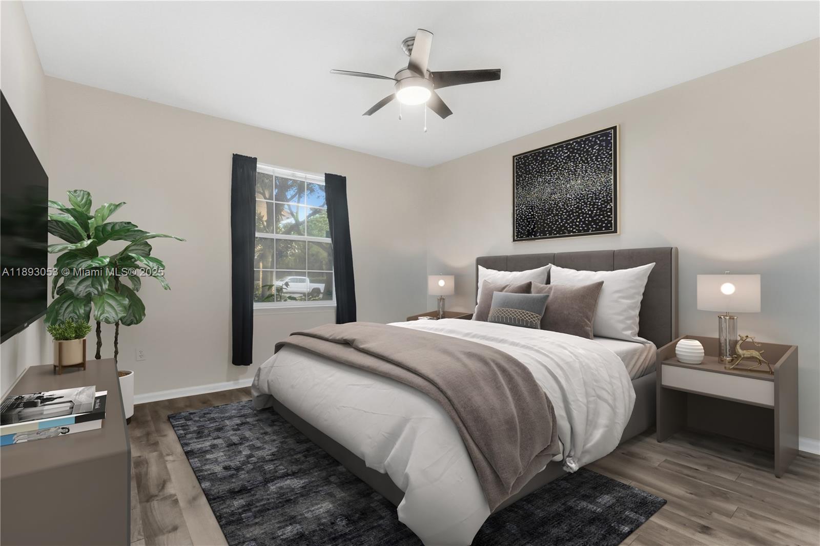 275 Murcia Drive, Unit 104 Jupiter, FL 33458 - Photo 9 of 26 a bedroom with bed and a potted plant