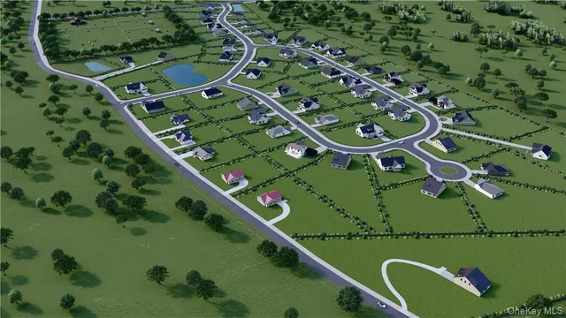 an aerial view of a residential houses with outdoor space