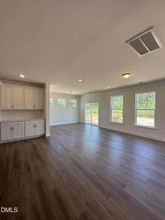 a view of wooden floor with a lake view