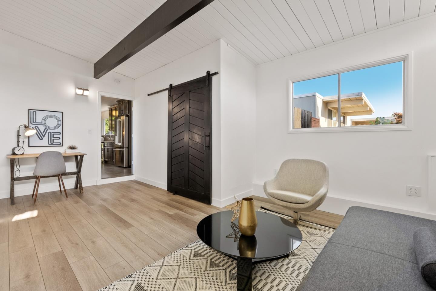 1420 Mallard Way Sunnyvale, CA 94087 - Photo 23 of 48 a living room with furniture and wooden floor