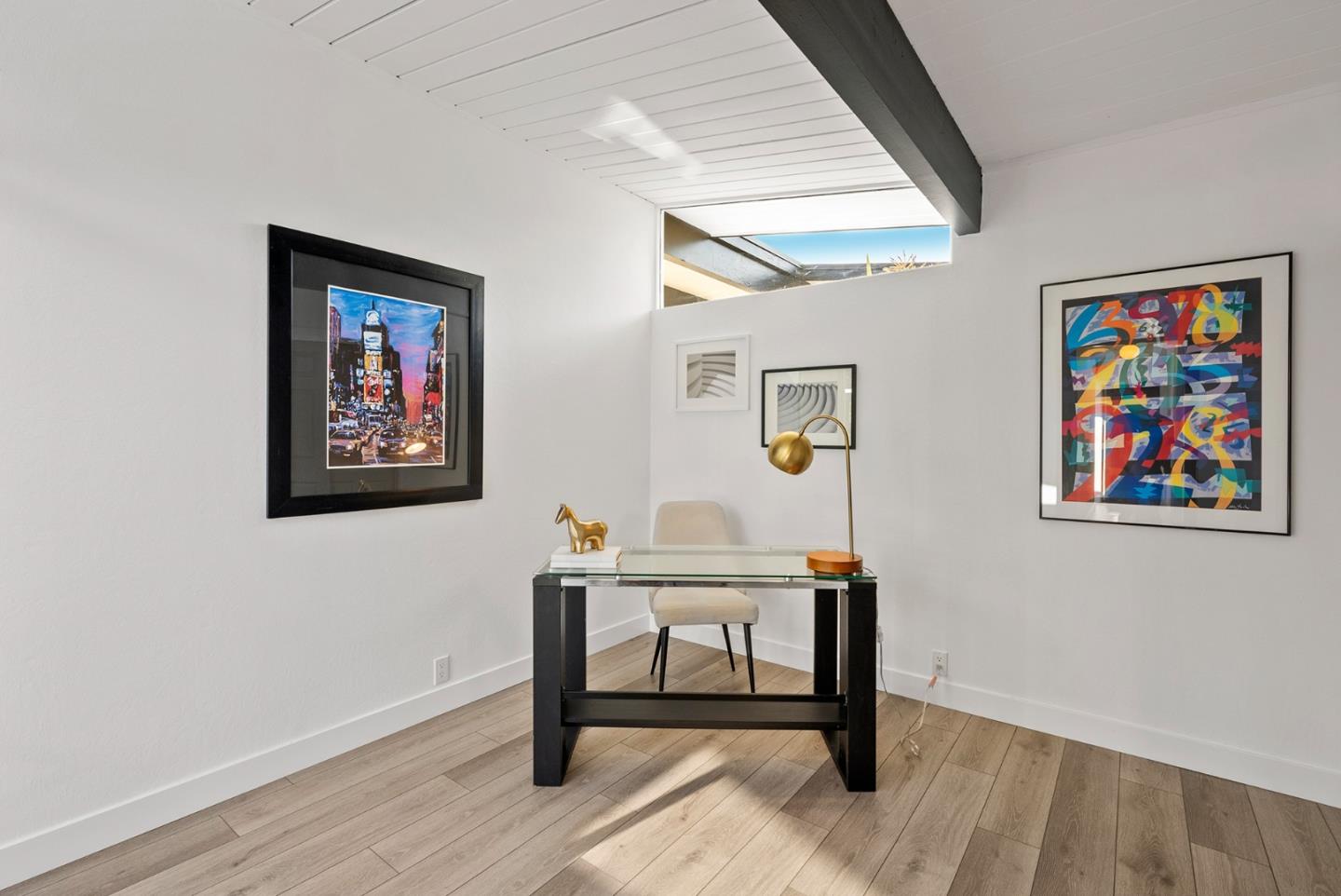 1420 Mallard Way Sunnyvale, CA 94087 - Photo 32 of 48 a workspace with furniture and paintings on the wall